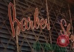 Image of signboards of various shops and services Saigon Vietnam, 1967, second 45 stock footage video 65675037265