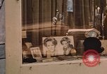 Image of signboards of various shops and services Saigon Vietnam, 1967, second 57 stock footage video 65675037265
