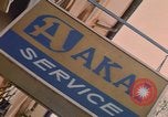 Image of signboards of various shops and services Saigon Vietnam, 1967, second 58 stock footage video 65675037265