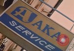 Image of signboards of various shops and services Saigon Vietnam, 1967, second 60 stock footage video 65675037265
