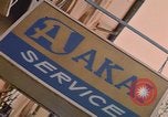 Image of signboards of various shops and services Saigon Vietnam, 1967, second 62 stock footage video 65675037265
