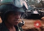 Image des soldats dans le casque de pétroliers Lai Khe Sud Vietnam, 1968, de la seconde 19 séquences d'archives historiques vidéo 65675037289