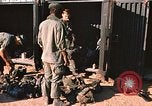 Image of unloading combat gear Vietnam, 1969, second 4 stock footage video 65675037300