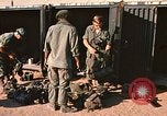 Image of unloading combat gear Vietnam, 1969, second 7 stock footage video 65675037300