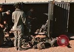 Image of unloading combat gear Vietnam, 1969, second 15 stock footage video 65675037300
