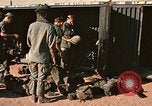 Image of unloading combat gear Vietnam, 1969, second 17 stock footage video 65675037300