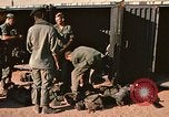 Image of unloading combat gear Vietnam, 1969, second 19 stock footage video 65675037300