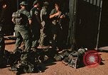 Image of unloading combat gear Vietnam, 1969, second 23 stock footage video 65675037300