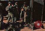 Image of unloading combat gear Vietnam, 1969, second 25 stock footage video 65675037300