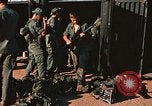 Image of unloading combat gear Vietnam, 1969, second 27 stock footage video 65675037300