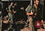 Image of unloading combat gear Vietnam, 1969, second 29 stock footage video 65675037300