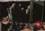 Image of unloading combat gear Vietnam, 1969, second 30 stock footage video 65675037300