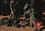 Image of unloading combat gear Vietnam, 1969, second 33 stock footage video 65675037300