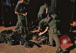 Image of unloading combat gear Vietnam, 1969, second 34 stock footage video 65675037300