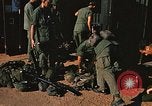 Image of unloading combat gear Vietnam, 1969, second 35 stock footage video 65675037300