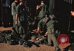 Image of unloading combat gear Vietnam, 1969, second 37 stock footage video 65675037300