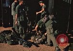 Image of unloading combat gear Vietnam, 1969, second 38 stock footage video 65675037300