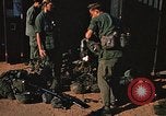 Image of unloading combat gear Vietnam, 1969, second 39 stock footage video 65675037300