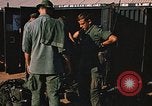 Image of unloading combat gear Vietnam, 1969, second 43 stock footage video 65675037300