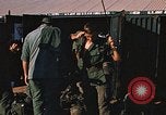 Image of unloading combat gear Vietnam, 1969, second 46 stock footage video 65675037300