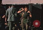 Image of unloading combat gear Vietnam, 1969, second 47 stock footage video 65675037300