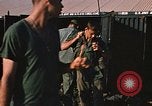 Image of unloading combat gear Vietnam, 1969, second 48 stock footage video 65675037300