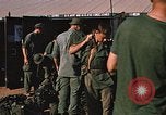 Image of unloading combat gear Vietnam, 1969, second 49 stock footage video 65675037300