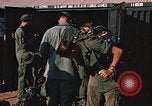 Image of unloading combat gear Vietnam, 1969, second 51 stock footage video 65675037300