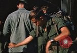 Image of unloading combat gear Vietnam, 1969, second 52 stock footage video 65675037300