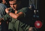 Image of unloading combat gear Vietnam, 1969, second 53 stock footage video 65675037300