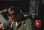 Image of unloading combat gear Vietnam, 1969, second 54 stock footage video 65675037300