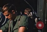 Image of unloading combat gear Vietnam, 1969, second 55 stock footage video 65675037300