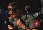 Image of unloading combat gear Vietnam, 1969, second 56 stock footage video 65675037300