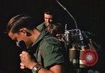 Image of unloading combat gear Vietnam, 1969, second 58 stock footage video 65675037300