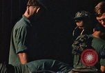 Image of unloading combat gear Vietnam, 1969, second 61 stock footage video 65675037300