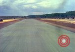 Standbild Flugzeuge landen Vietnam, 1967, aus Sekunde 57 historischem Filmmaterial Videoclip 65675037303