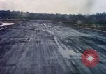 Standbild Flugzeuge landen Tom Le Chom Vietnam, 1967, aus Sekunde 49 historischem Filmmaterial Videoclip 65675037305