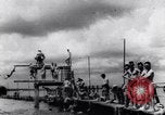 Image of prisoners swimming and playing Pacific theater, 1941, second 4 stock footage video 65675037310