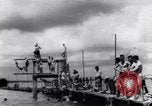 Image of prisoners swimming and playing Pacific theater, 1941, second 5 stock footage video 65675037310
