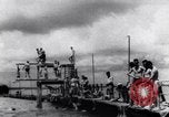 Image of prisoners swimming and playing Pacific theater, 1941, second 6 stock footage video 65675037310