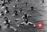 Image of prisoners swimming and playing Pacific theater, 1941, second 9 stock footage video 65675037310