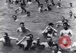 Image of prisoners swimming and playing Pacific theater, 1941, second 14 stock footage video 65675037310