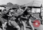 Image of prisoners swimming and playing Pacific theater, 1941, second 59 stock footage video 65675037310