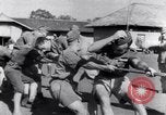 Image of prisoners swimming and playing Pacific theater, 1941, second 60 stock footage video 65675037310