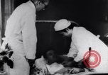 Image of Medical check up of war prisoners Pacific theater, 1941, second 57 stock footage video 65675037312