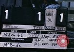 Image of loading of cargo onto a ship Saigon Vietnam, 1966, second 9 stock footage video 65675037333