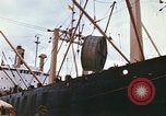 Image of loading of cargo onto a ship Saigon Vietnam, 1966, second 13 stock footage video 65675037333