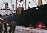 Image of loading of cargo onto a ship Saigon Vietnam, 1966, second 16 stock footage video 65675037333