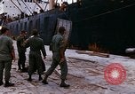 Image of loading of cargo onto a ship Saigon Vietnam, 1966, second 18 stock footage video 65675037333