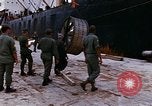 Image of loading of cargo onto a ship Saigon Vietnam, 1966, second 19 stock footage video 65675037333